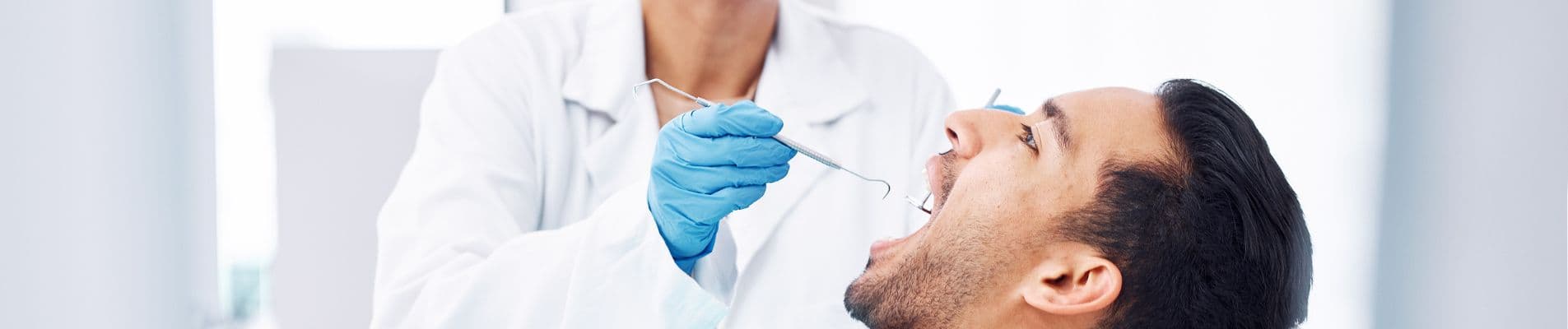 Swollen Gum with Pus: Telling a Periodontal Abscess from a Periapical One